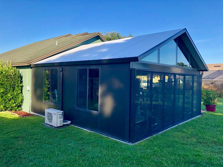 New conditioned sunroom glass room in Ruskin FL by Graco Construction - Patios and Enclosures in Ruskin